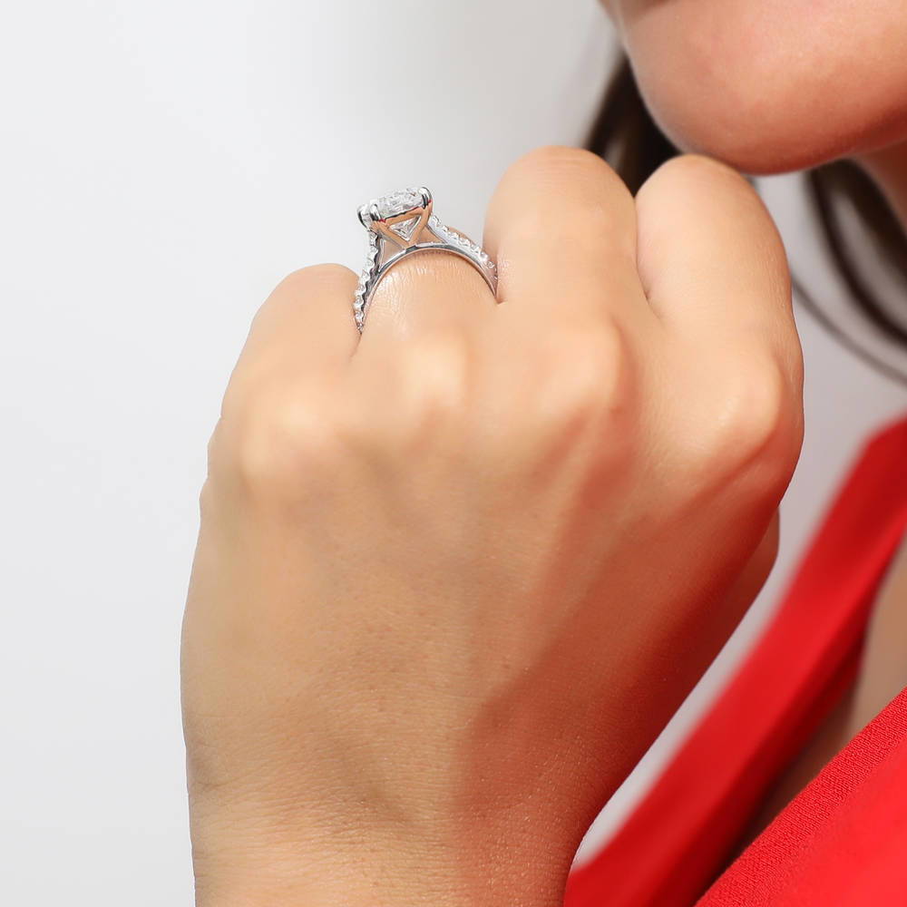 Model wearing Solitaire 5.5ct Oval CZ Ring Set in Sterling Silver, 8 of 12