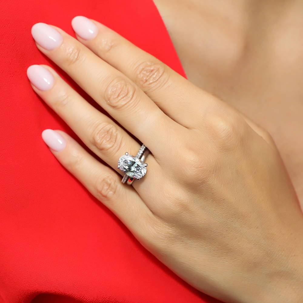 Model wearing Solitaire 5.5ct Oval CZ Ring Set in Sterling Silver, 6 of 12