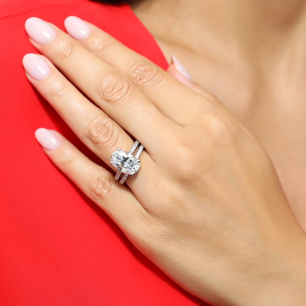 Model wearing Solitaire 5.5ct Oval CZ Ring Set in Sterling Silver, 7 of 12