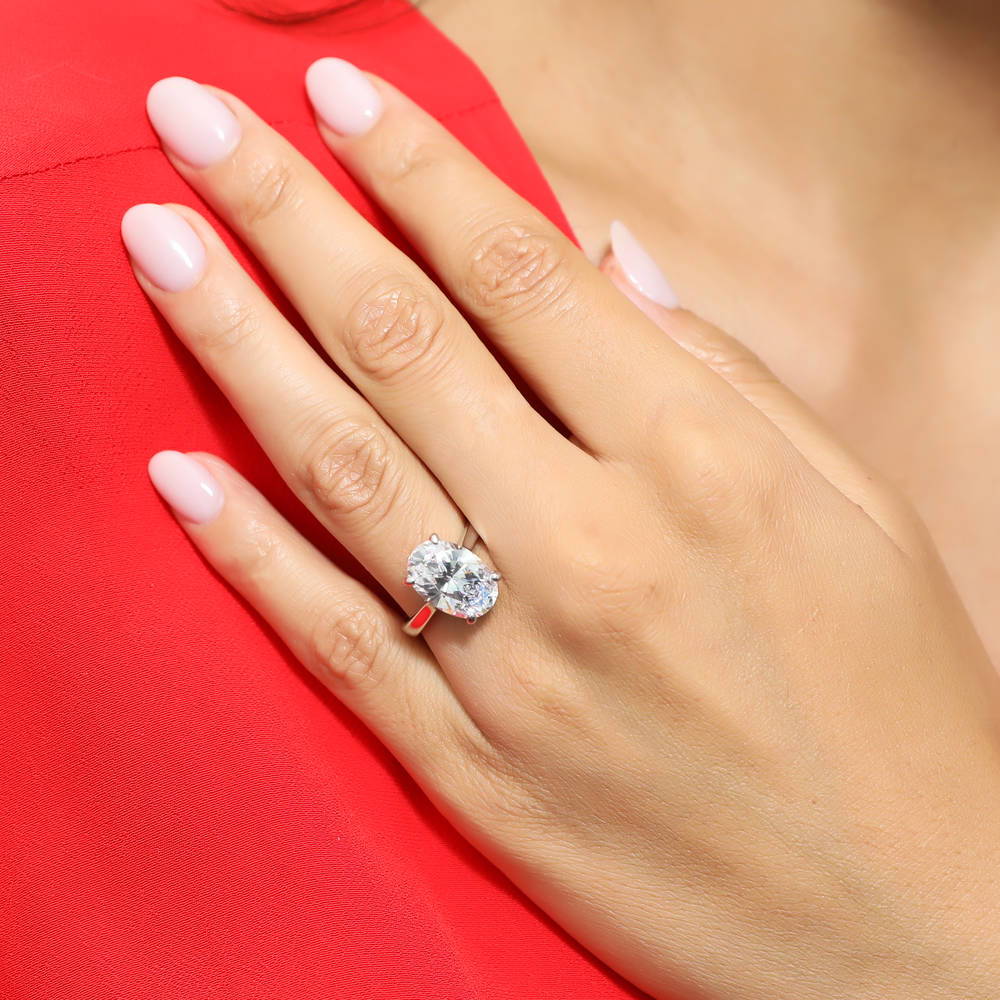 Model wearing Solitaire 5.5ct Oval CZ Statement Ring in Sterling Silver, 2 of 7