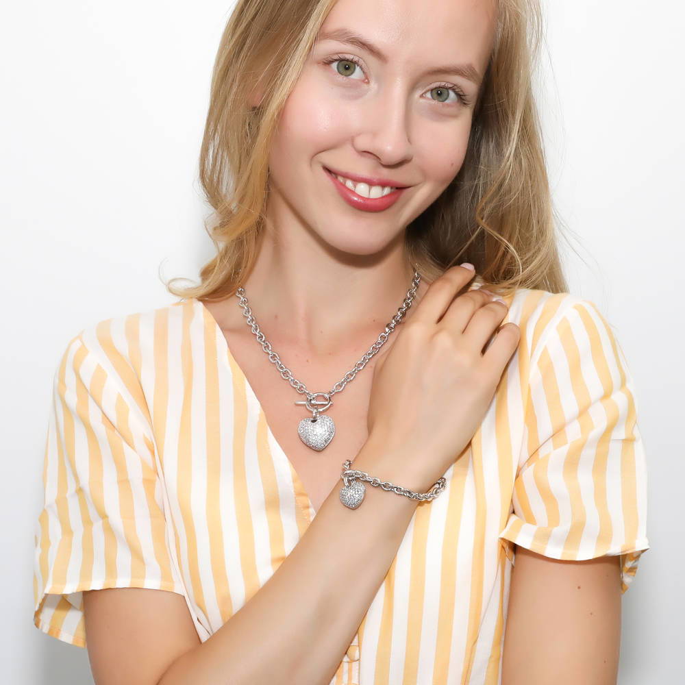 Model wearing Heart CZ Necklace Earrings and Bracelet Set in Silver-Tone, 9 of 18