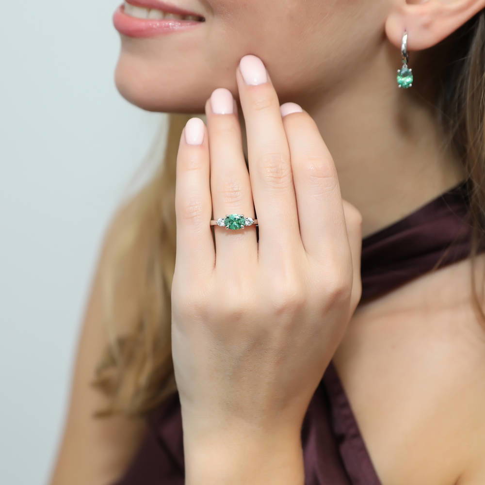 Model wearing 3-Stone East-West Green Oval CZ Ring in Sterling Silver, 2 of 7