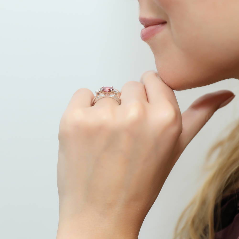 Model wearing 3-Stone East-West Red Oval CZ Ring in Sterling Silver, 3 of 7