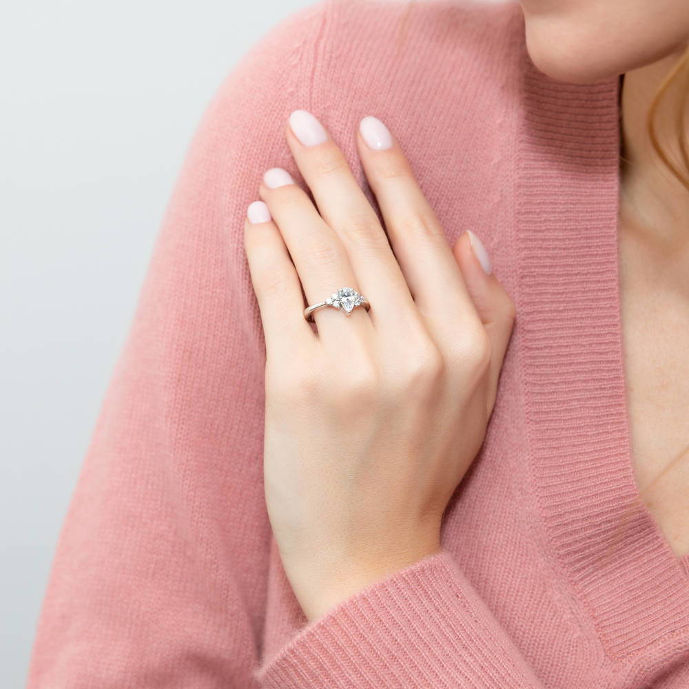 Model wearing Solitaire 0.8ct Pear CZ Ring in Sterling Silver, 2 of 7