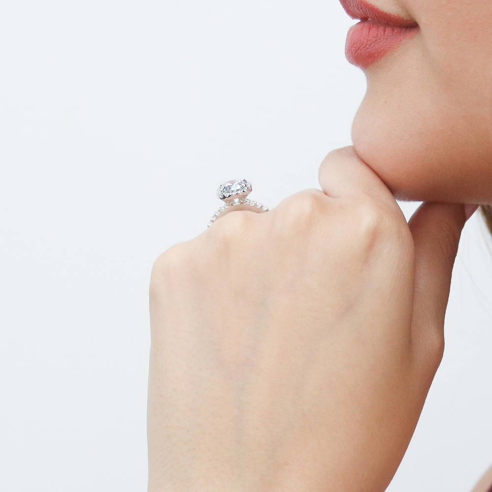 Model wearing Halo Round CZ Ring Set in Sterling Silver, 9 of 11