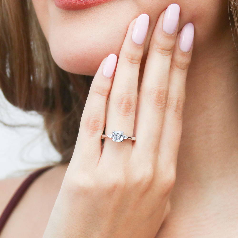 Model wearing 3-Stone Cushion CZ Ring in Sterling Silver, 2 of 10