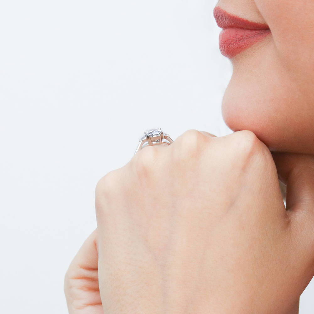 Model wearing 3-Stone Cushion CZ Ring in Sterling Silver, 6 of 10