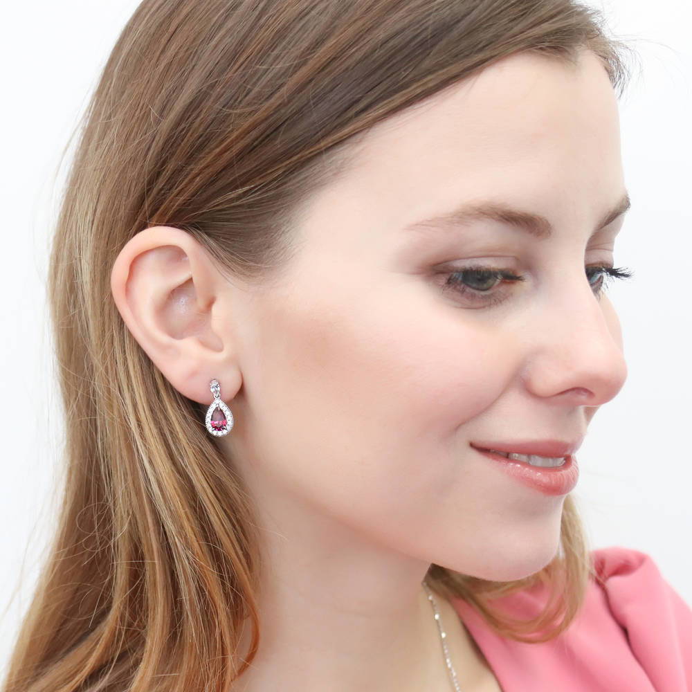 Model wearing Halo Red Pear CZ Necklace and Earrings Set in Sterling Silver, 3 of 10