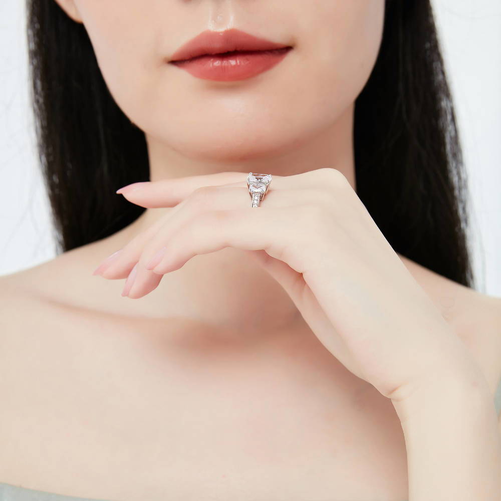 Model wearing 3-Stone Cushion CZ Ring in Sterling Silver, 5 of 9