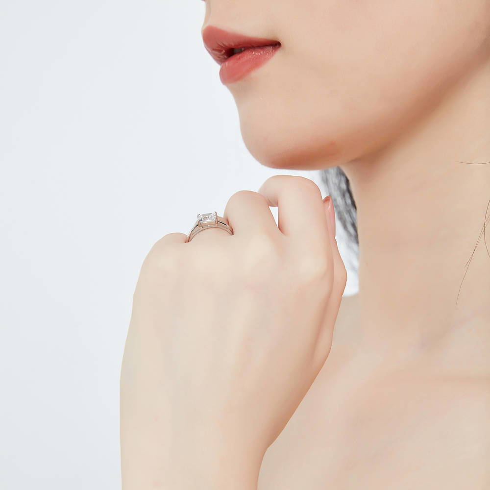 Model wearing Solitaire 1.6ct Princess CZ Ring in Sterling Silver, 7 of 9
