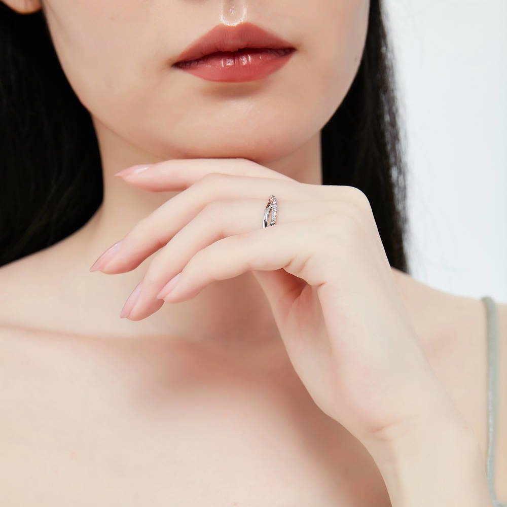 Model wearing 3-Stone Criss Cross Round CZ Ring Set in Sterling Silver, 11 of 12