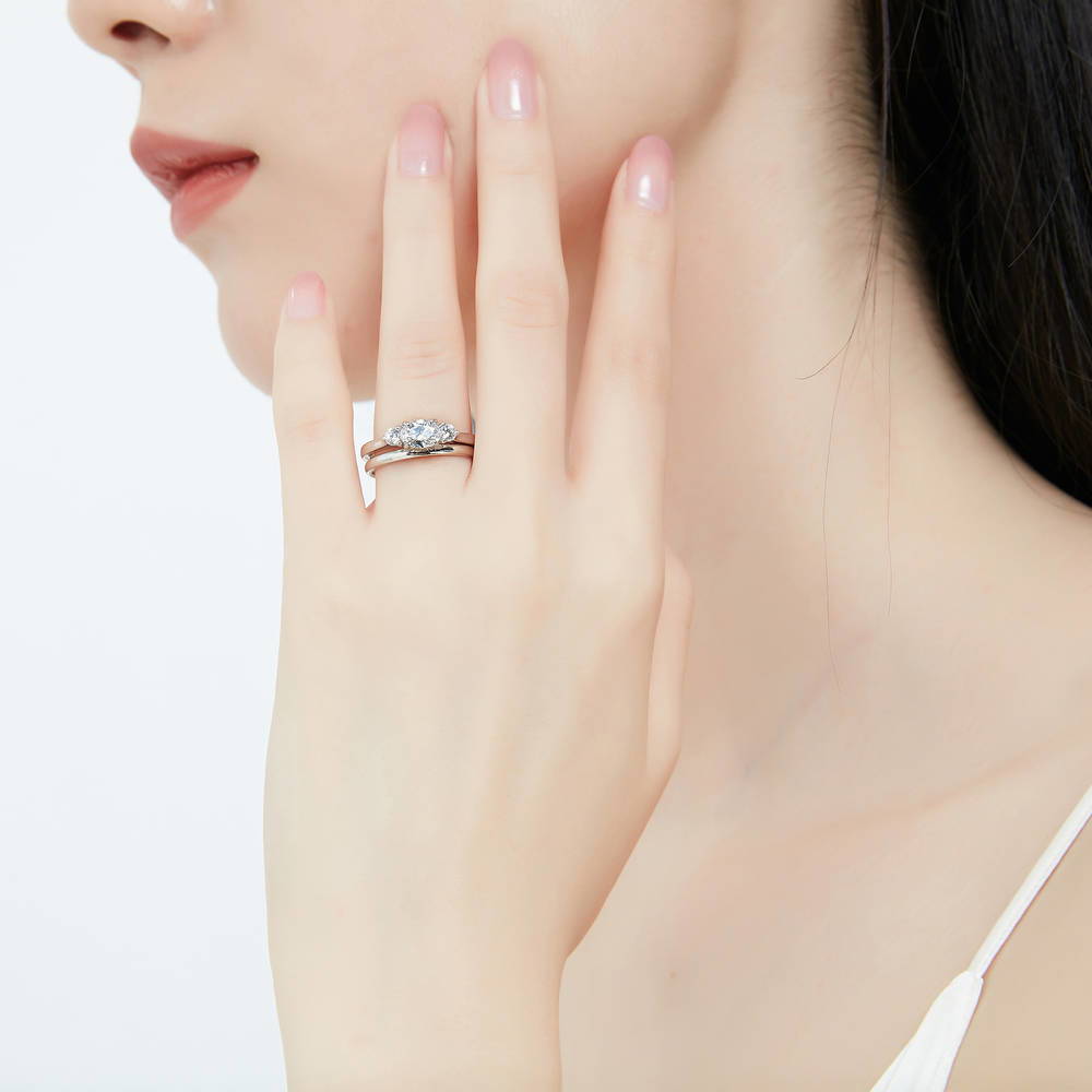 Model wearing 3-Stone East-West Oval CZ Ring Set in Sterling Silver, 2 of 11