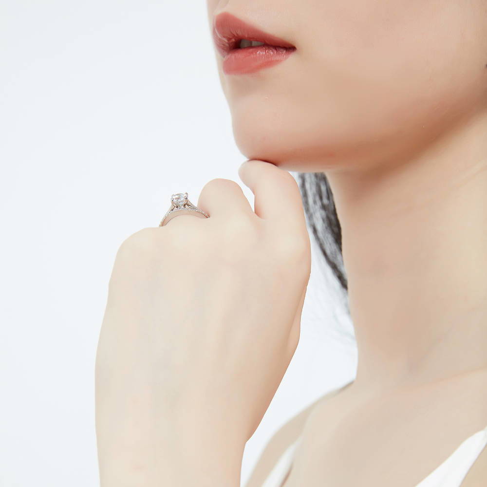 Model wearing Solitaire 1ct Round CZ Ring Set in Sterling Silver, 7 of 16