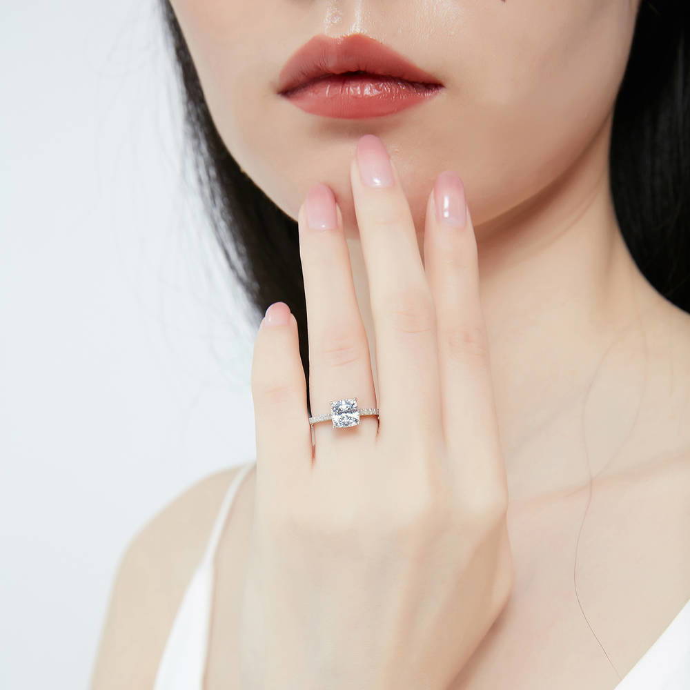 Model wearing Solitaire 2ct Cushion CZ Ring in Sterling Silver, 2 of 7