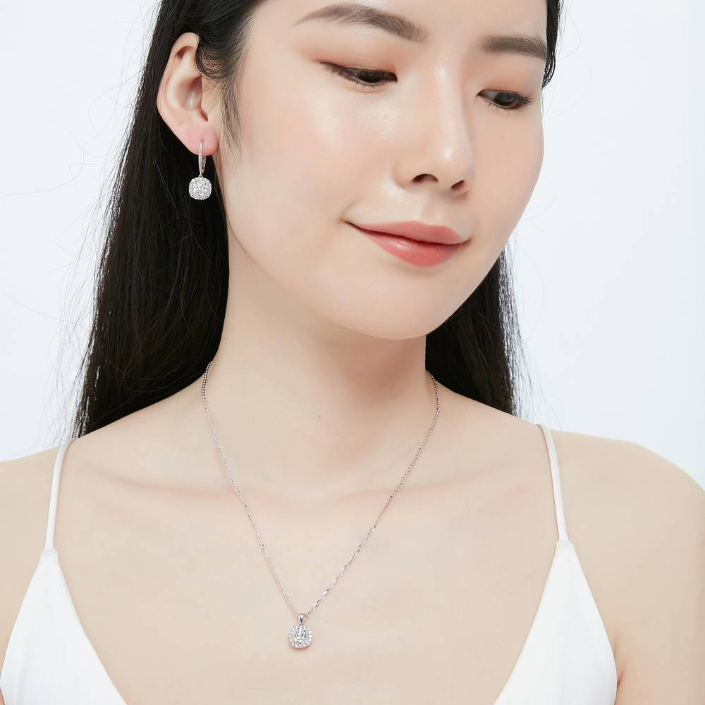 Model wearing Halo Cushion CZ Pendant Necklace in Sterling Silver, 5 of 6