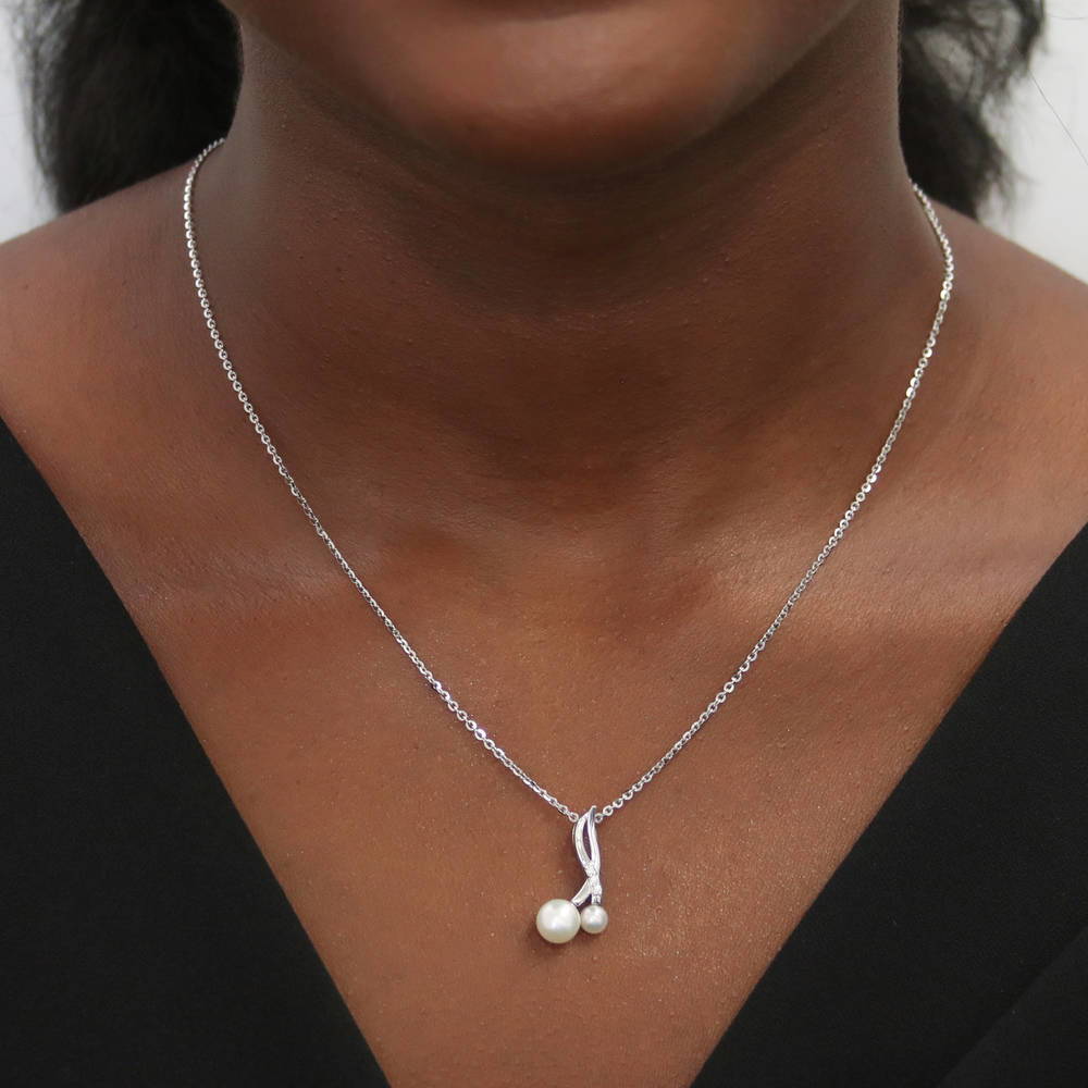 Infinity White Button Cultured Pearl Set in Sterling Silver