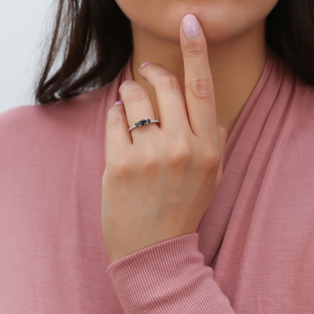 Model wearing 3-Stone Round CZ Ring in Sterling Silver, 2 of 10