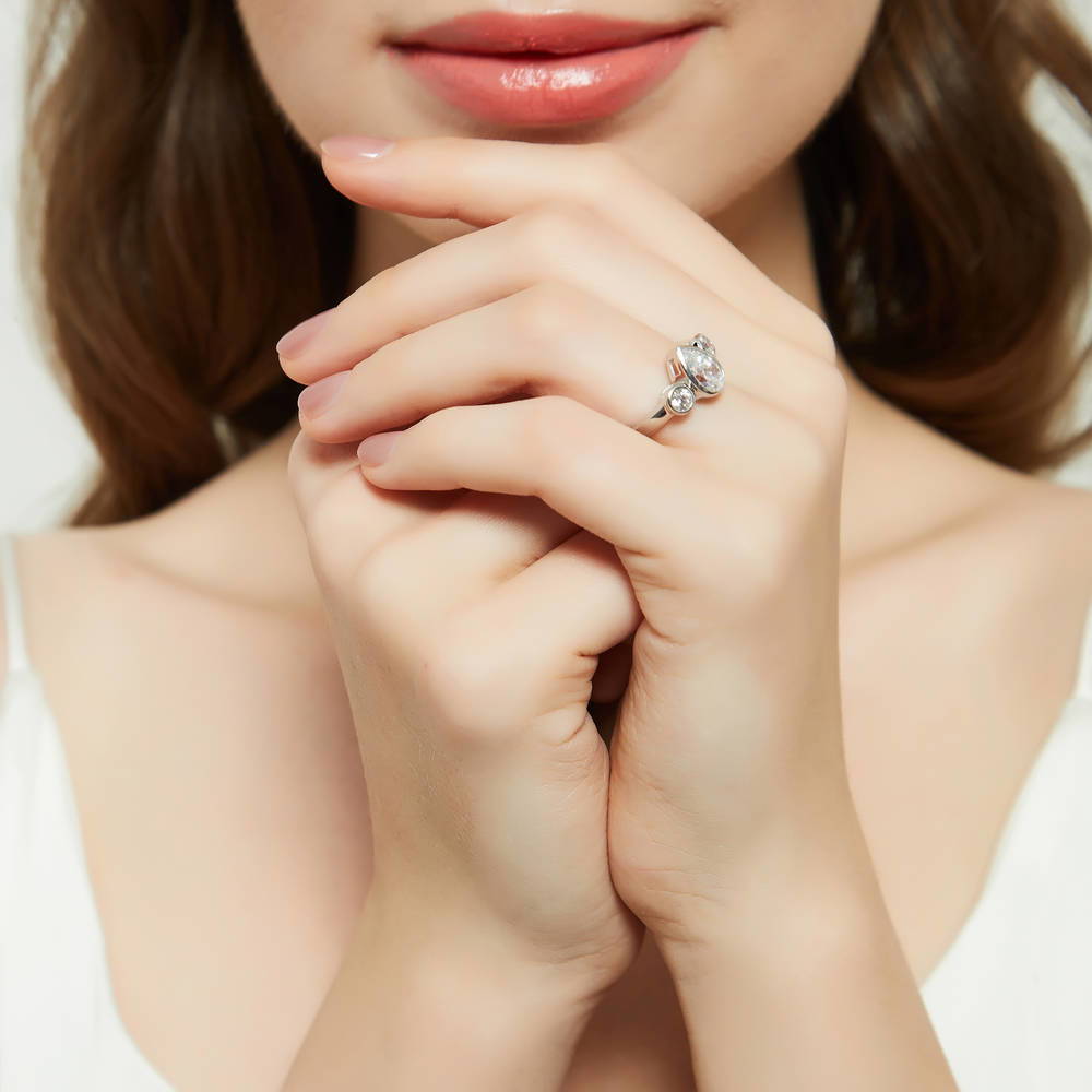Model wearing 3-Stone Pear CZ Ring in Sterling Silver, 6 of 8