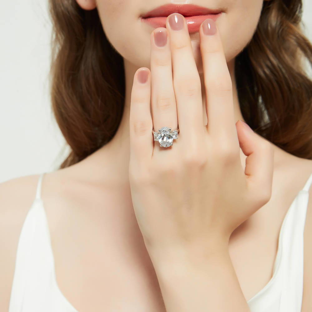 Model wearing 3-Stone Oval CZ Statement Ring in Sterling Silver, 2 of 13