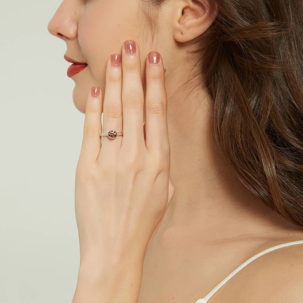 Model wearing Solitaire Caramel Bezel Set Round CZ Ring in Sterling Silver 0.8ct, 3 of 8