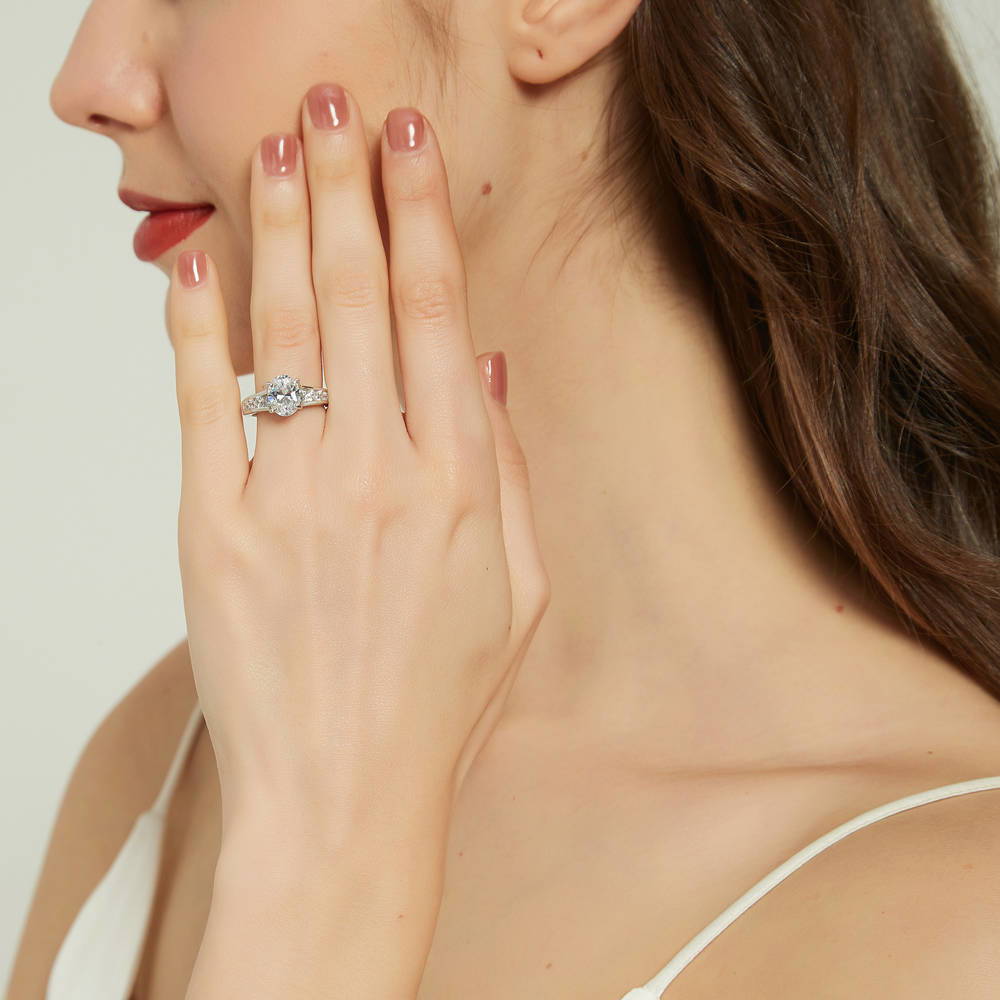 Model wearing Solitaire 2.5ct Oval CZ Ring in Sterling Silver, 3 of 8