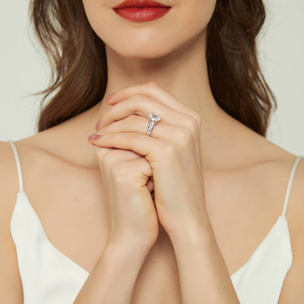 Model wearing Solitaire 2.5ct Oval CZ Ring in Sterling Silver, 6 of 8
