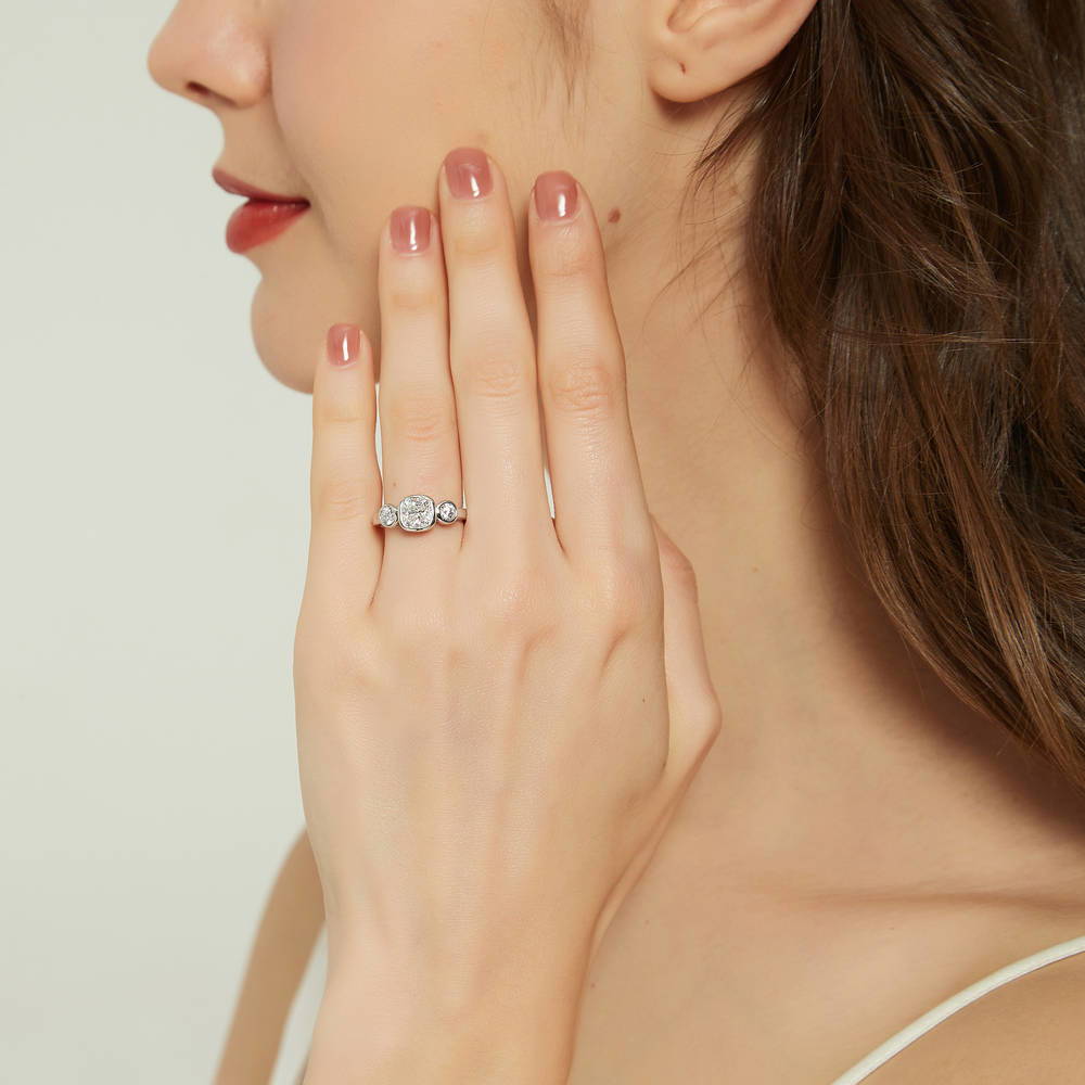 Model wearing 3-Stone Cushion CZ Ring in Sterling Silver, 3 of 8