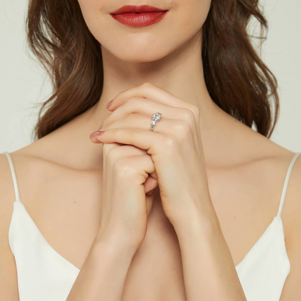 Model wearing 3-Stone Cushion CZ Ring in Sterling Silver, 6 of 8
