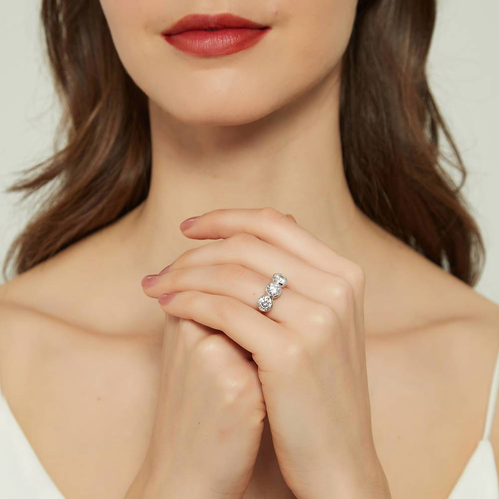 Model wearing 3-Stone Round CZ Ring in Sterling Silver, 7 of 9