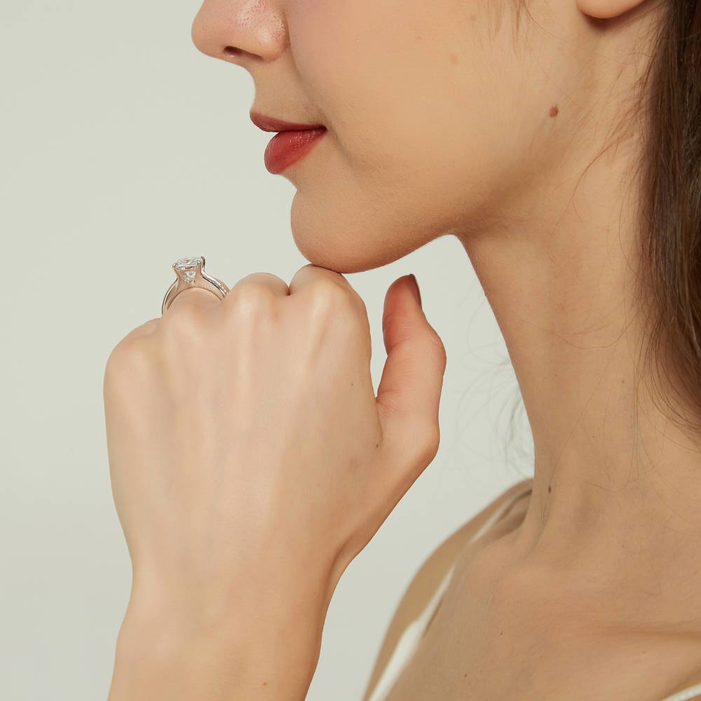 Model wearing Solitaire 3ct Cushion CZ Ring in Sterling Silver, 7 of 8