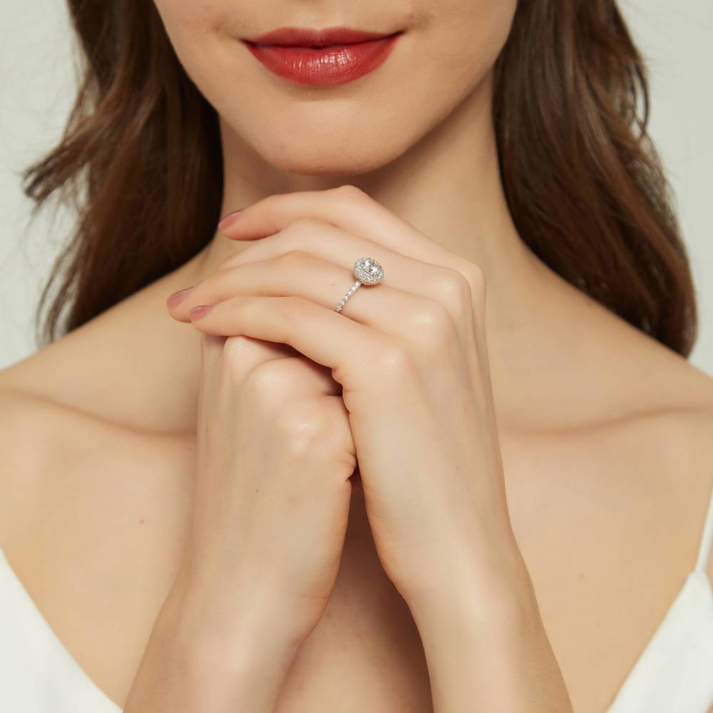 Model wearing Halo Round CZ Ring Set in Sterling Silver, 11 of 15