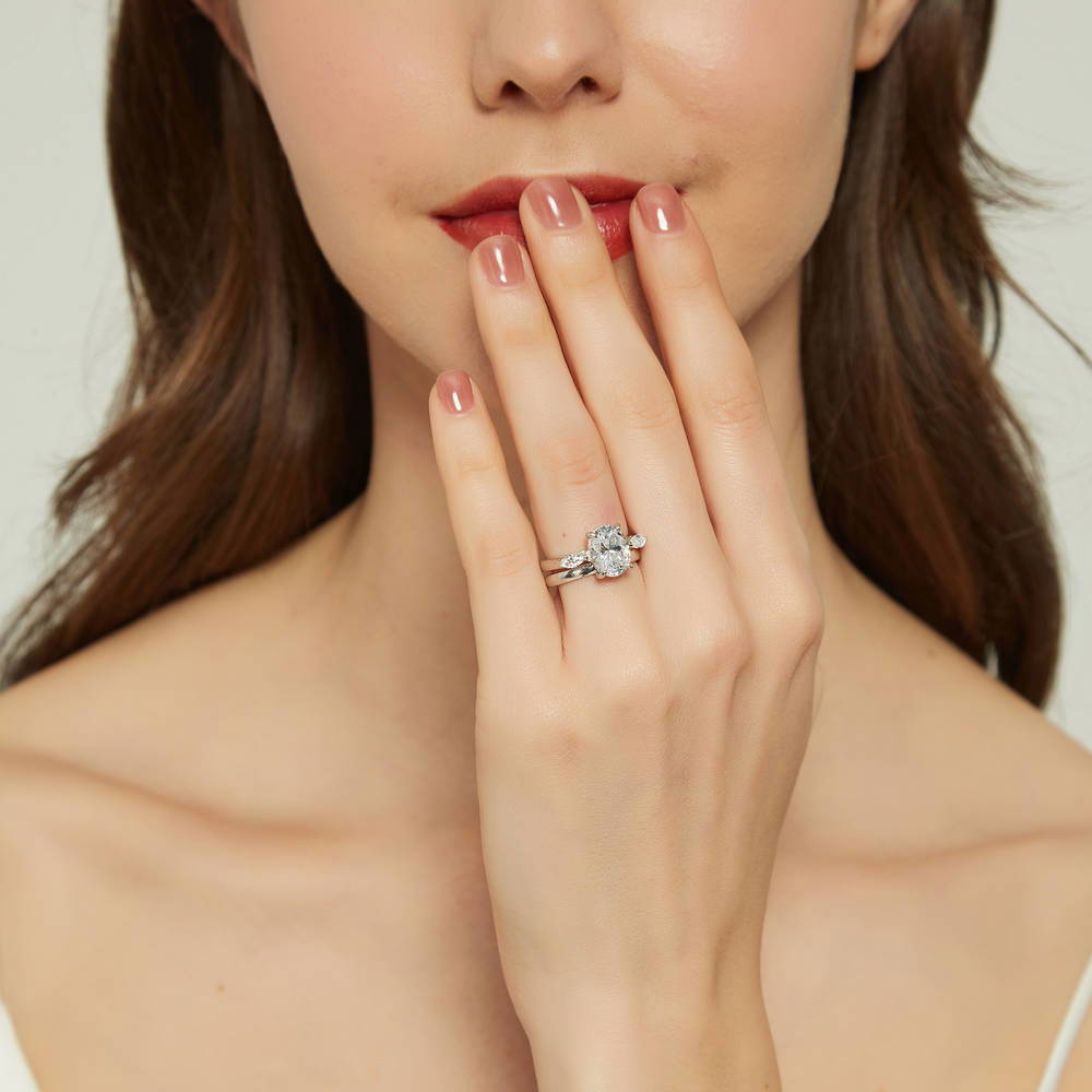 Model wearing 3-Stone Oval CZ Ring Set in Sterling Silver, 2 of 13