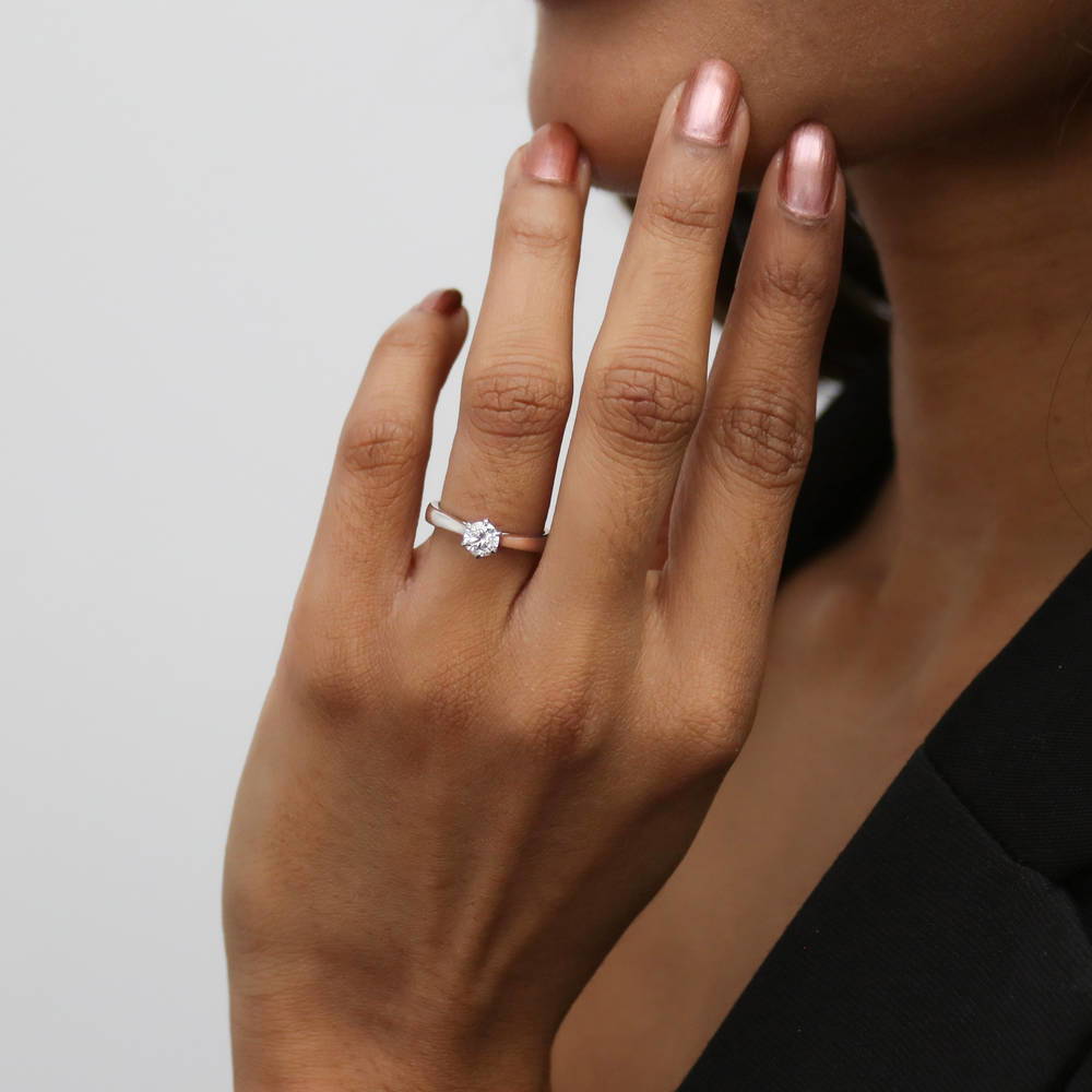 Model wearing Solitaire 0.45ct Round CZ Ring Set in Sterling Silver, 12 of 15
