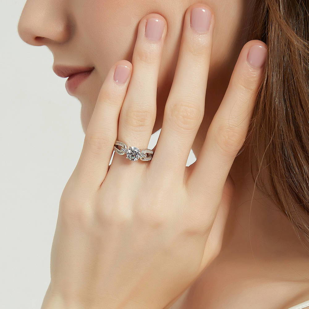 Model wearing Solitaire Interlocking 1.25ct Round CZ Ring in Sterling Silver, 2 of 8