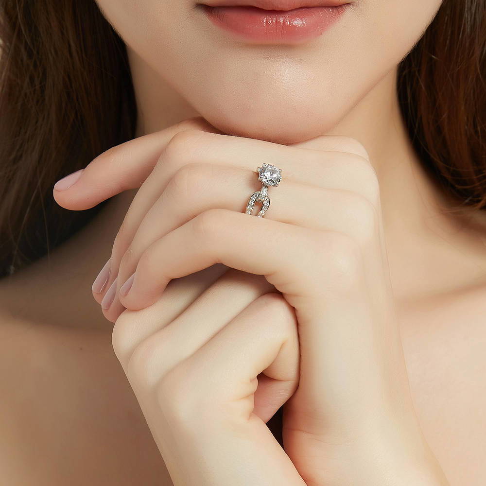 Model wearing Solitaire Interlocking 1.25ct Round CZ Ring in Sterling Silver, 6 of 8