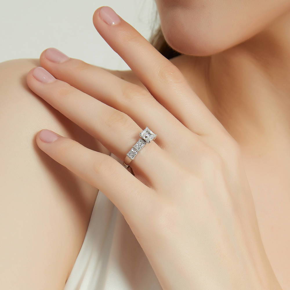 Model wearing Solitaire 1.2ct Princess CZ Ring in Sterling Silver, 3 of 8