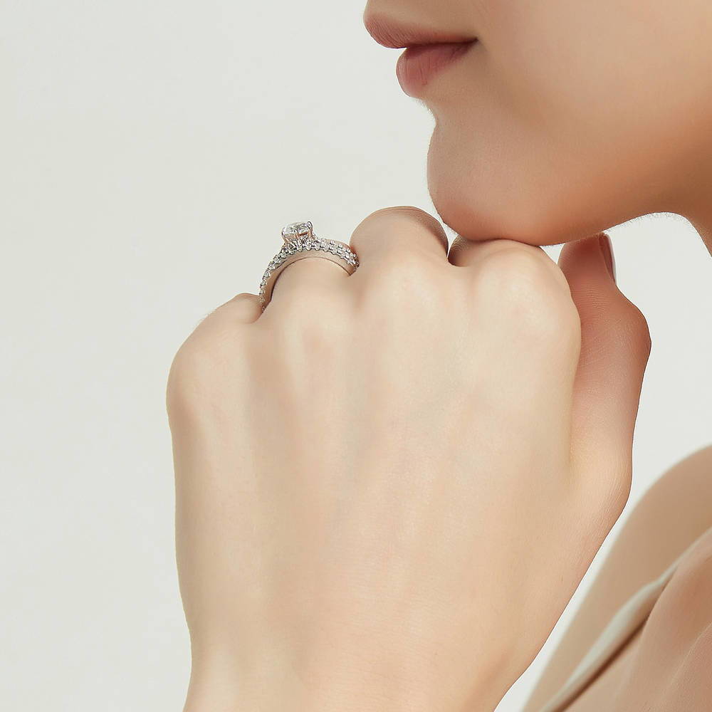 Model wearing Solitaire 0.8ct Round CZ Ring Set in Sterling Silver, 8 of 13