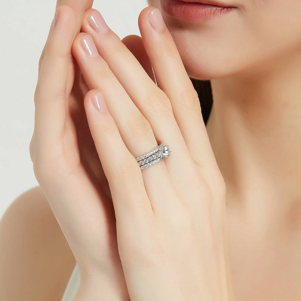 Model wearing Solitaire 0.8ct Round CZ Ring Set in Sterling Silver, 5 of 13