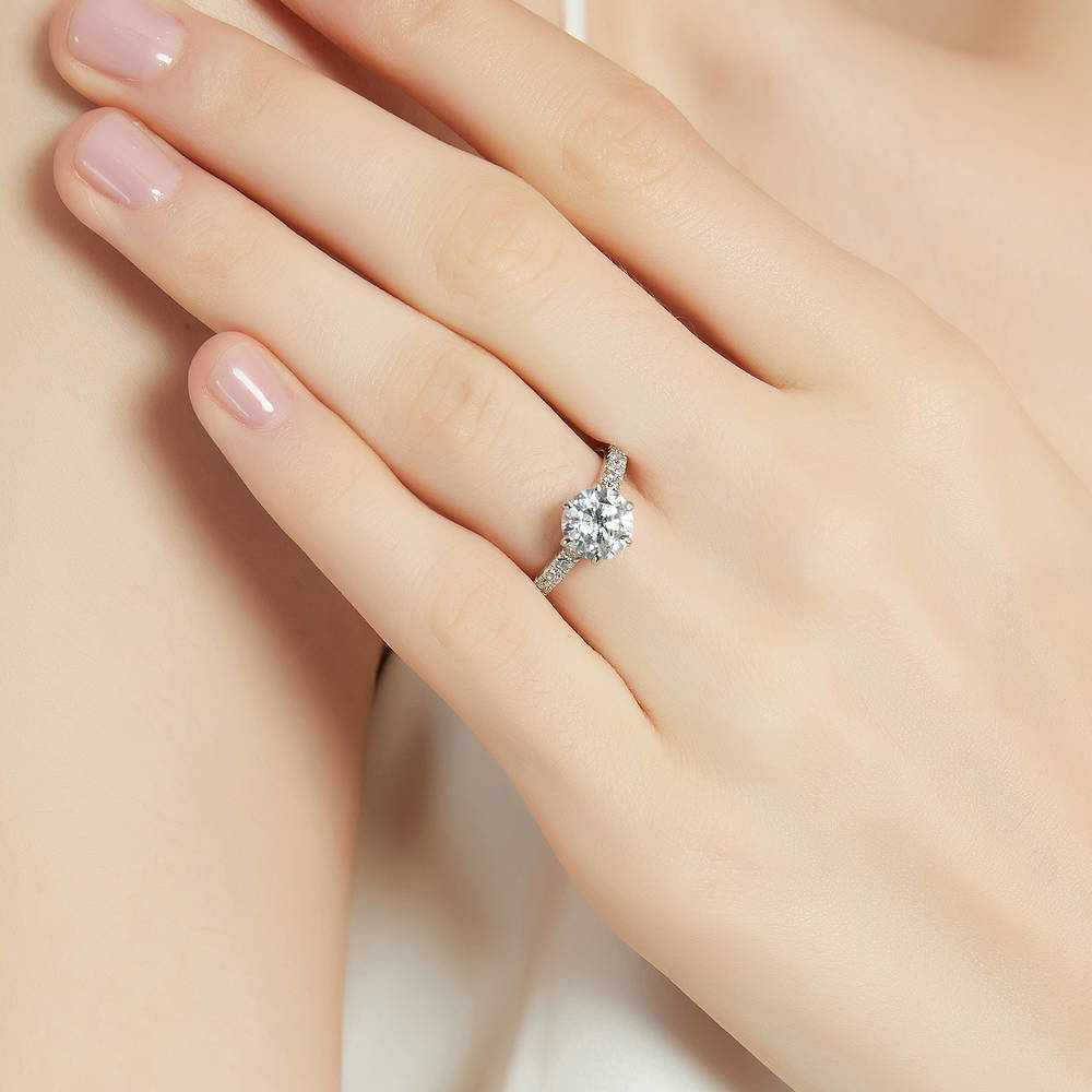 Model wearing Solitaire 2ct Round CZ Ring Set in Sterling Silver, 9 of 13