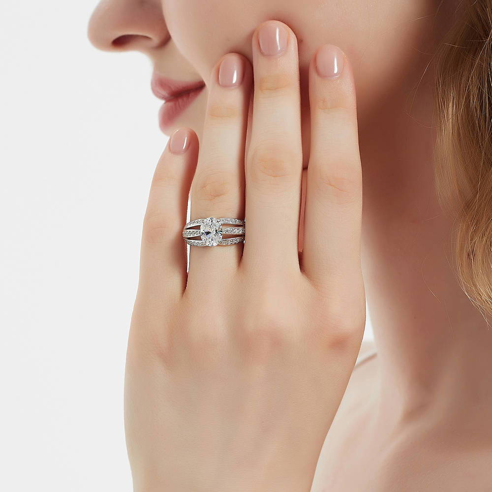 Model wearing Solitaire 1.8ct Oval CZ Ring in Sterling Silver, 2 of 8