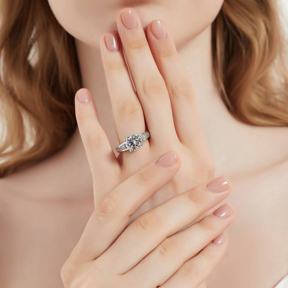 Model wearing Solitaire 2.7ct Round CZ Ring Set in Sterling Silver, 9 of 19