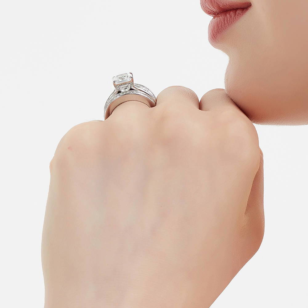 Model wearing Solitaire 3ct Cushion CZ Ring Set in Sterling Silver, 7 of 16