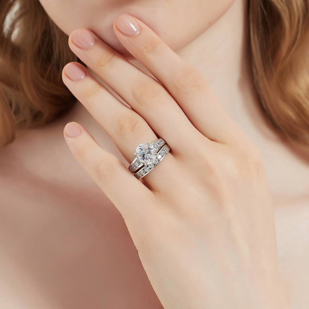 Model wearing Solitaire 2.5ct Oval CZ Ring Set in Sterling Silver, 2 of 16