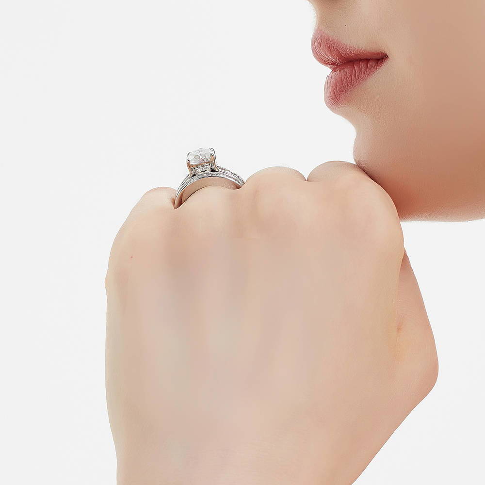Model wearing Solitaire 3ct Pear CZ Ring Set in Sterling Silver, 7 of 17