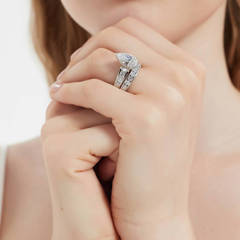 Model wearing Solitaire 3ct Pear CZ Ring Set in Sterling Silver, 6 of 17