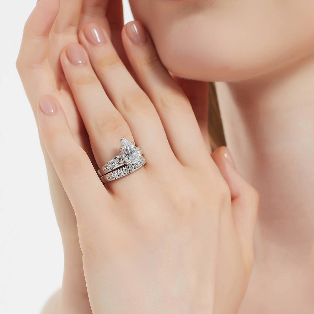 Model wearing Solitaire 3ct Pear CZ Ring Set in Sterling Silver, 3 of 17