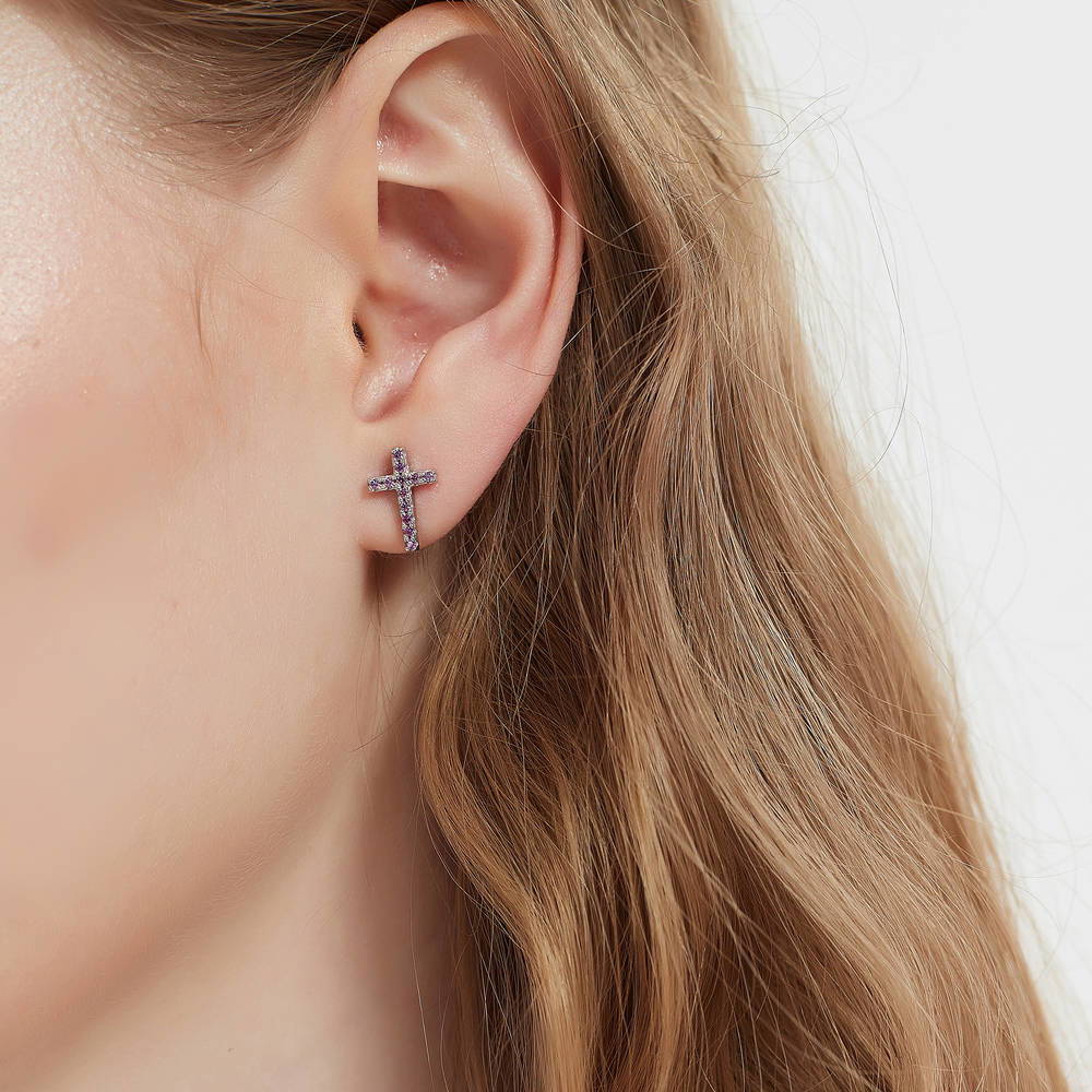 Model wearing Cross CZ Stud Earrings in Sterling Silver, Green Color