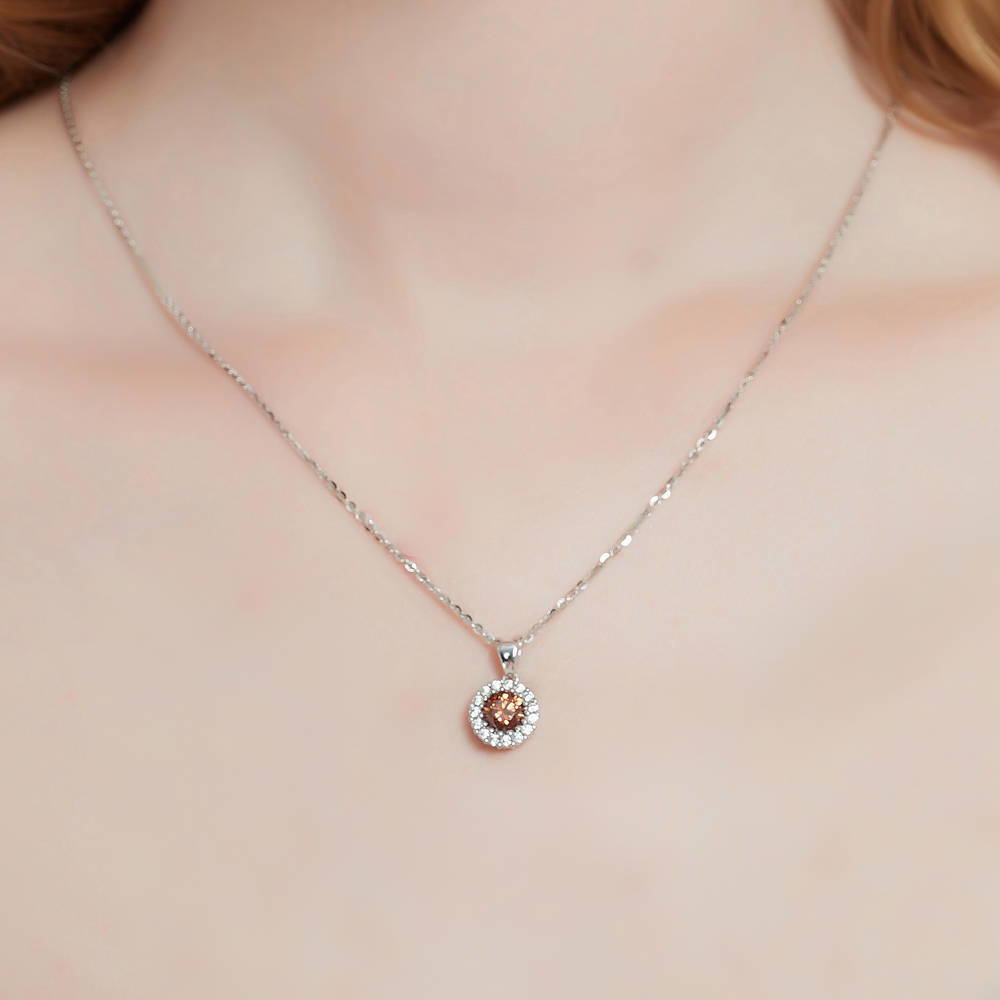 Model wearing Halo Caramel Round CZ Pendant Necklace in Sterling Silver, 2 of 8