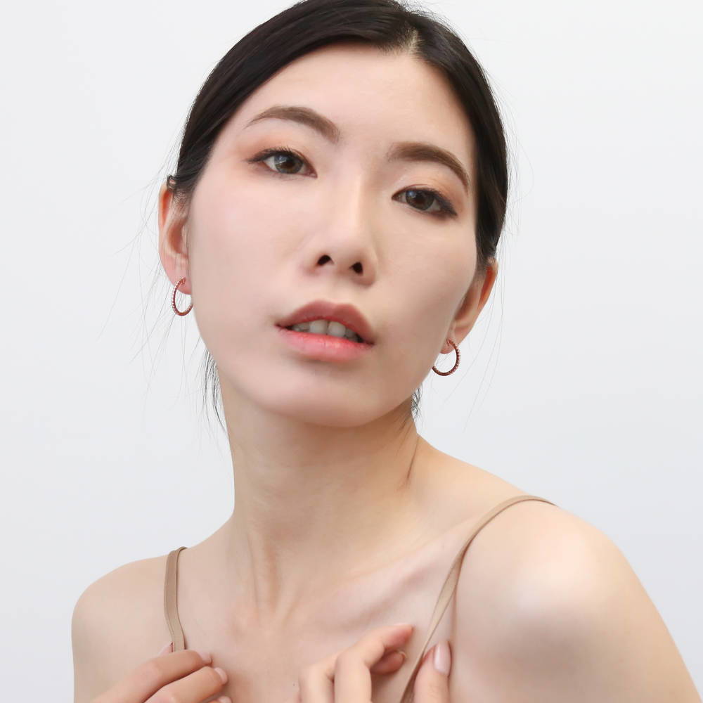 Model wearing CZ Small Inside-Out Hoop Earrings in Sterling Silver 0.8 inch, Rose Gold Flashed