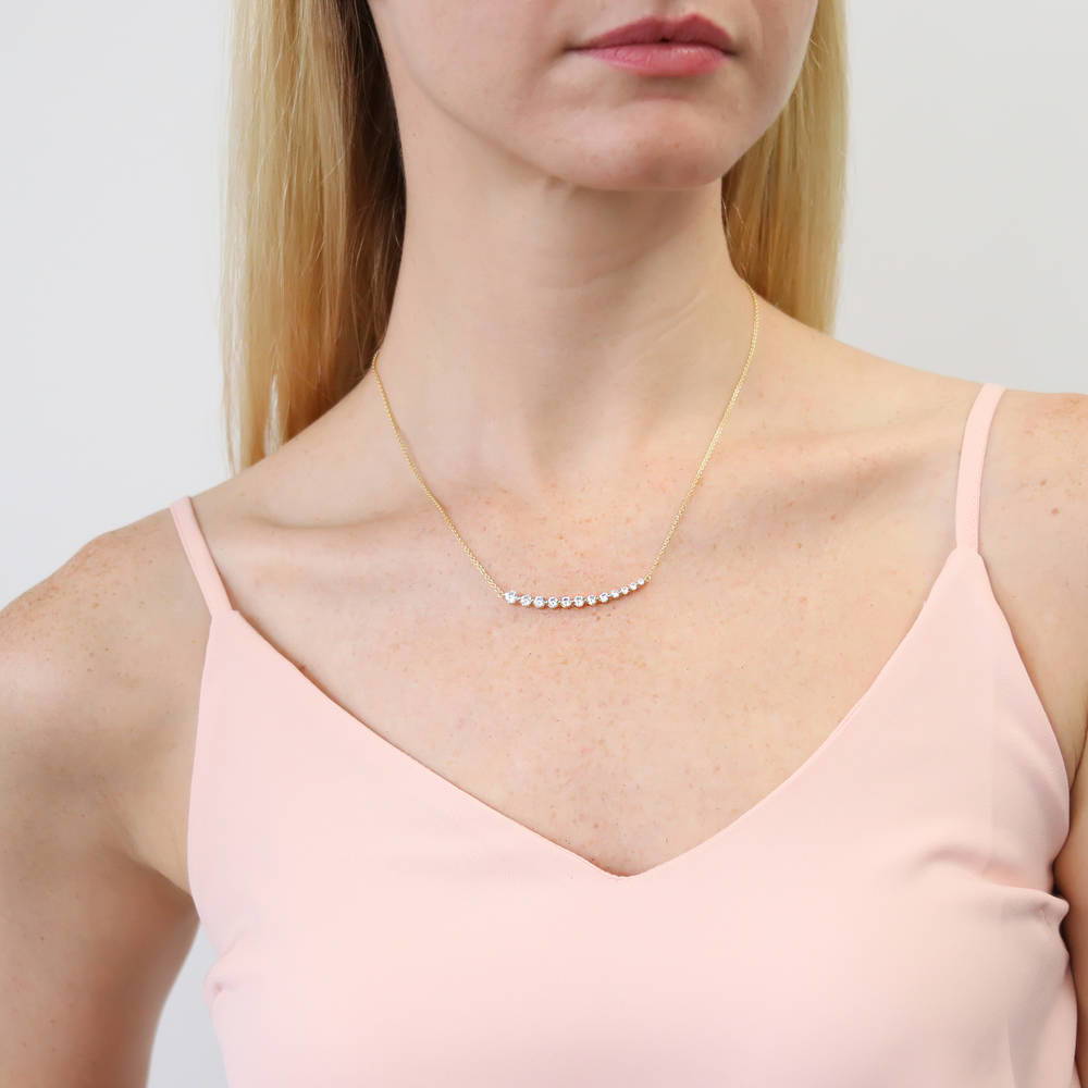 Model wearing Graduated Bar CZ Pendant Necklace in Gold Flashed Sterling Silver, 2 of 5